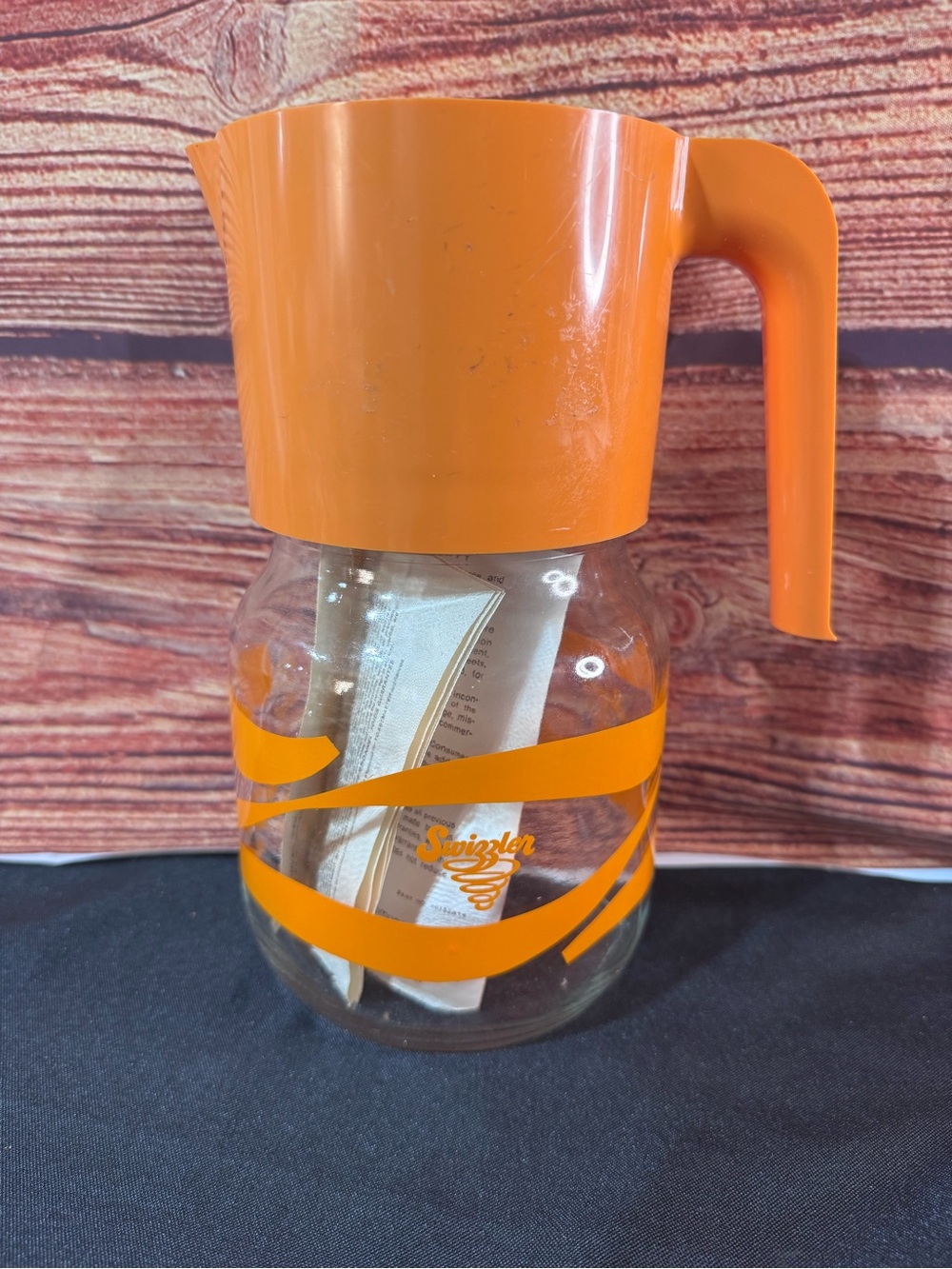 “Swizzler” by Toastmaster Orange Glass Pitcher with stirring Swizzler 1970’s